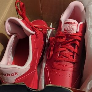 Reebok Red and Pink Sneakers with Iconic Logo and Bold Design